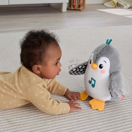 Fisher-Price Pingüino que saluda y se balancea